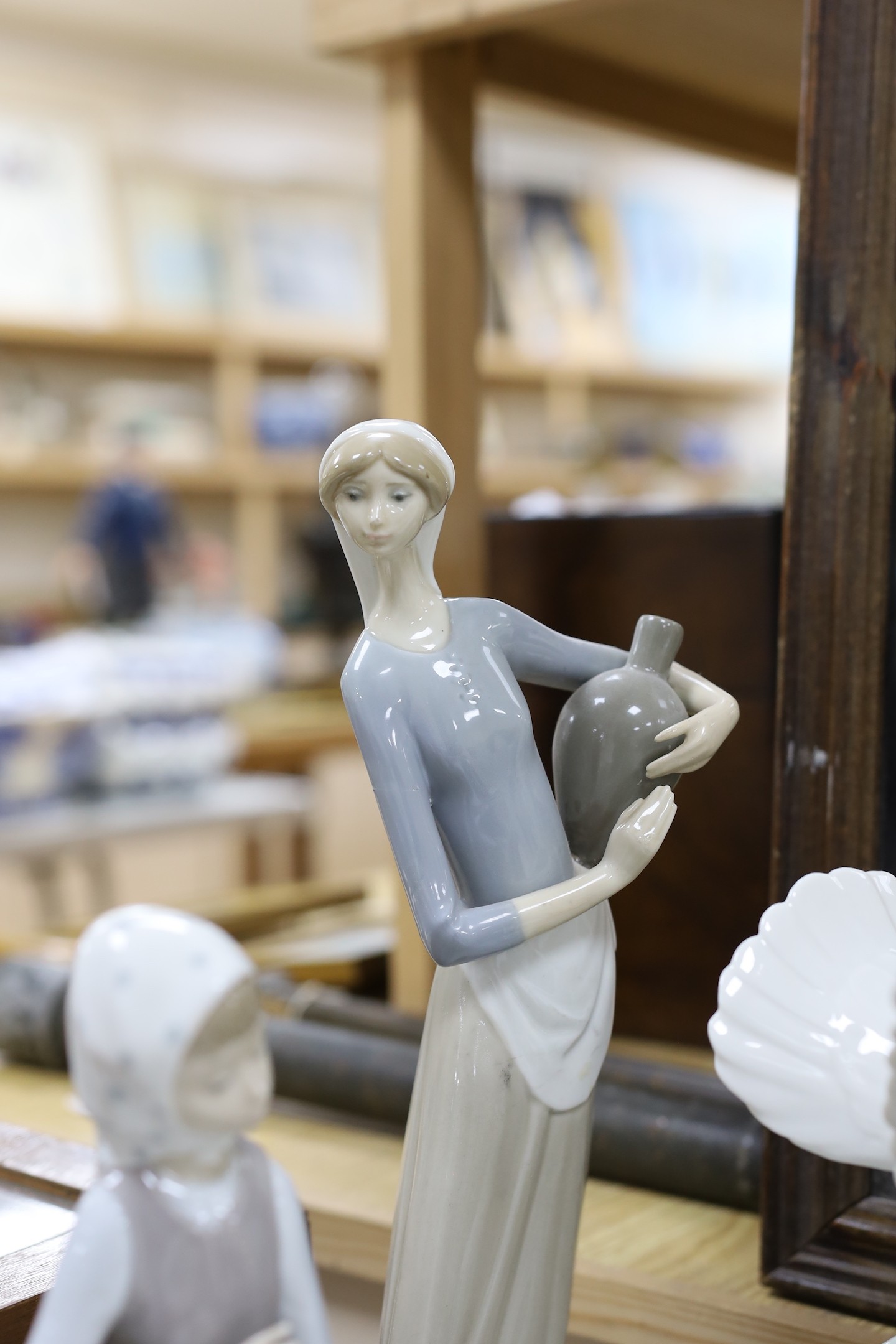 A collection of Lladro figure groups (8) tallest Virgin Mary 34cms high